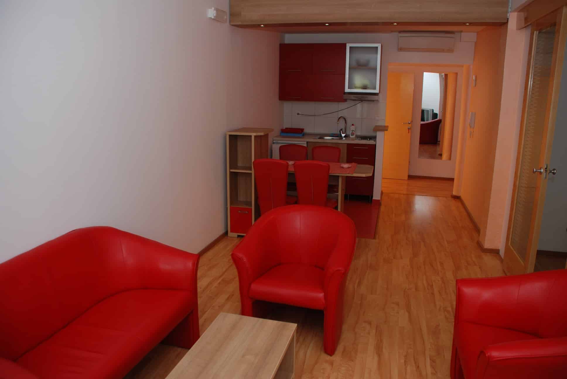 Red apartment livingroom Springs apartments Montenegro